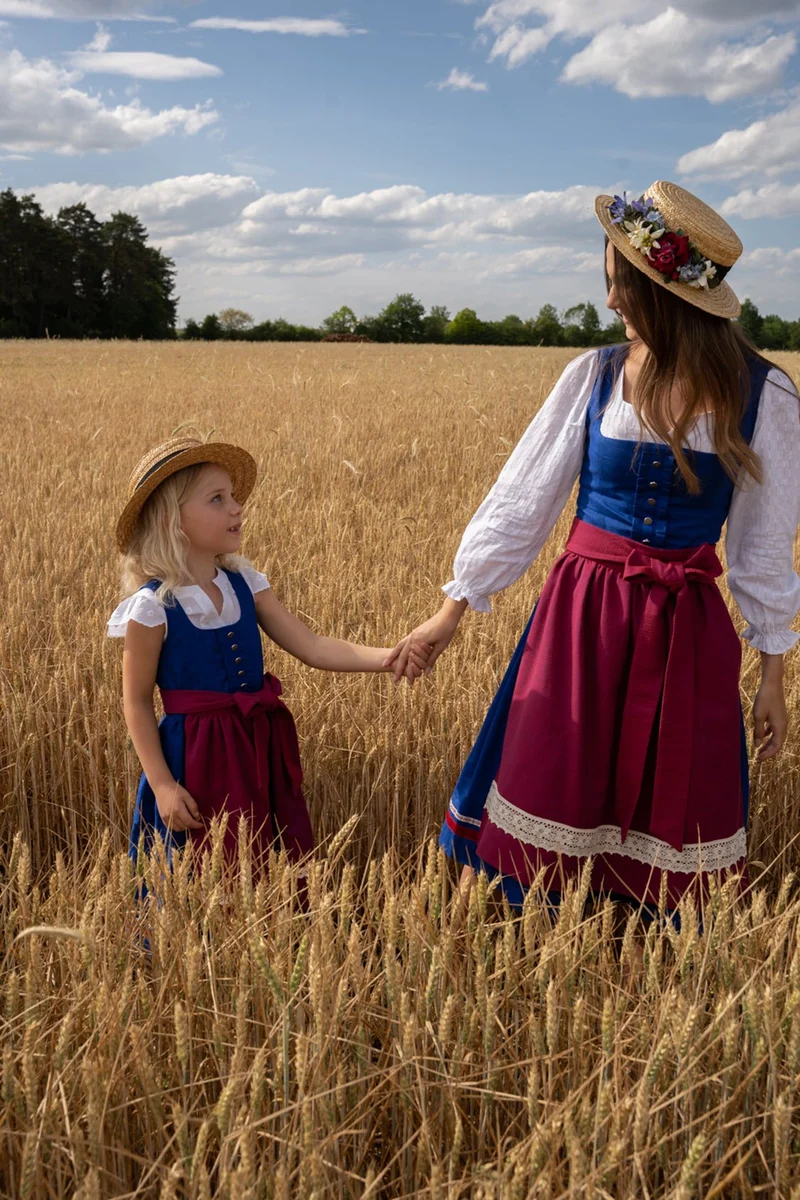 LEINENDIRNDL LIMITED EDITION 2023 TEGERNSEE TRADITION ENZIAN/ ROT