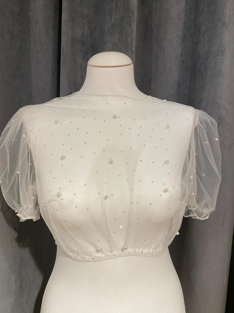Dirndlbluse Marjo Geldersheim mit Perlen