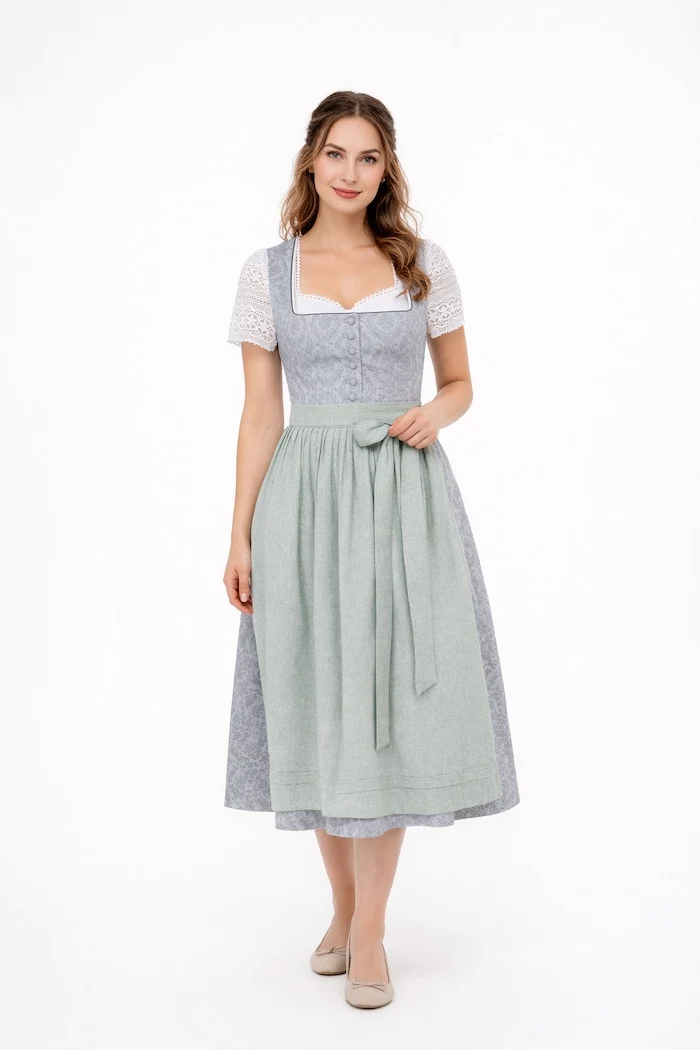 Dirndl aus Baumwolldruck mit uni Schürze