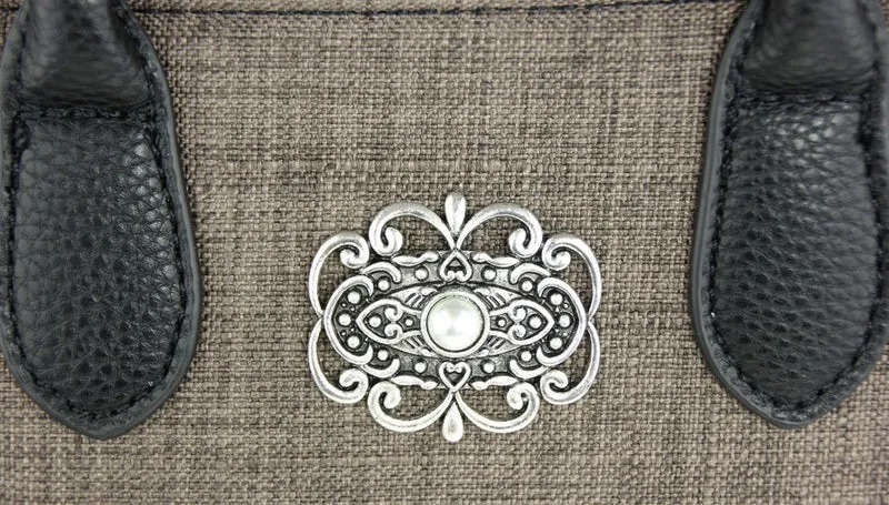 Handtasche "Katrina" mit Metallapplikation | Dunkelbraun