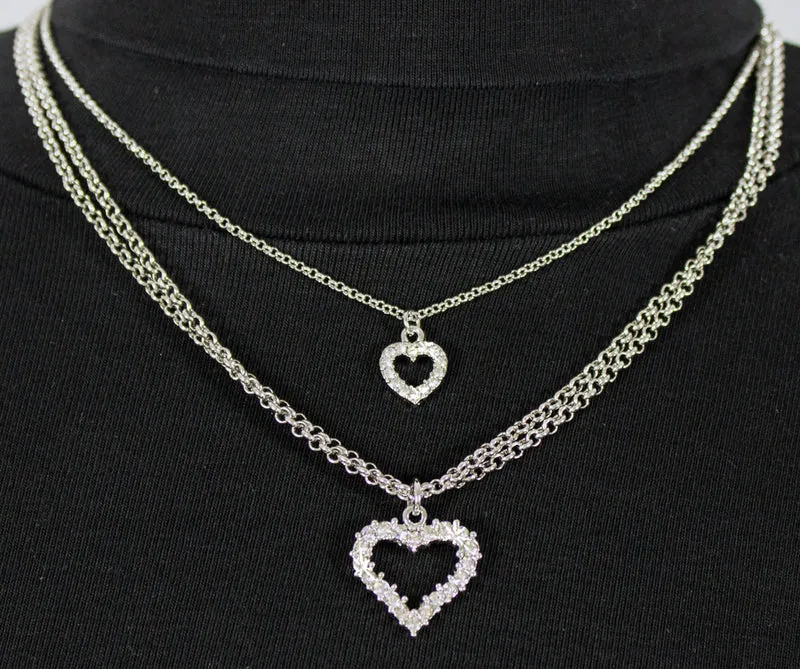 LUISIA® Doppel Halskette mit Herzanhängern und Premium Kristallen - Silber